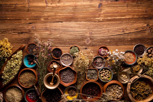 Natural Medicine Background Assorted Dry Herbs Bowls Mortar Plants Rustic — стоковое фото