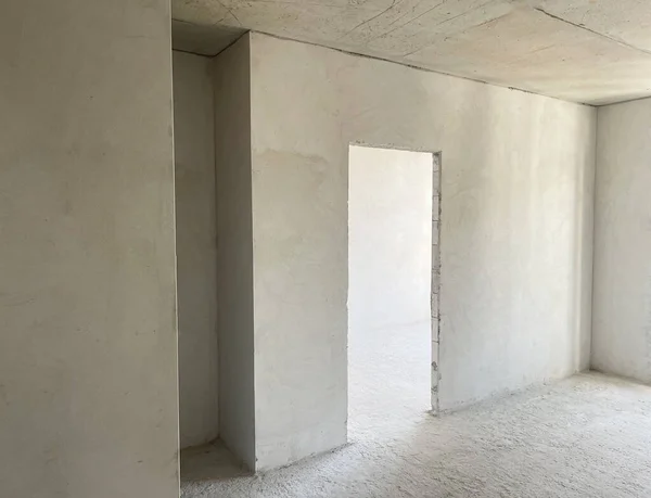 Stock image Interior of the apartment without decoration in gray colors.