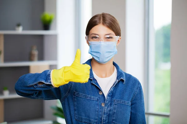 stock image Portrait of happy female cleaner with cleaning equipment in office.