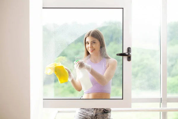Woman Purple Shirt Cleaning Window Cleanser Spray Rag — Stock Photo, Image