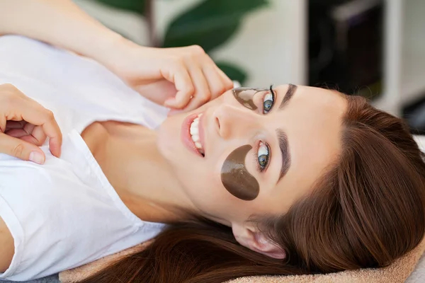Woman Eye Patches Relaxing Spa Center — Stock Photo, Image