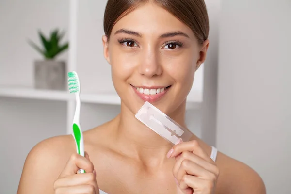 Teeth Whitening Beautiful Smiling Woman Holding Whitening Strip — Stock Photo, Image