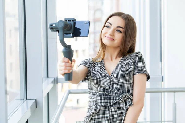 stock image Smiling businesswoman looking at camera make conference business call.