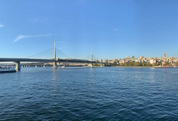 Golden Horn Bridge in Istanbul, Turkey. It is a cable-stayed bridge carring a metro M2 line and is located between the Galata Bridege and Ataturk Bridge. Istanbul, formerly known as Constantinople, is the largest city in Turkey, serving as the countr