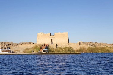 Temple of Kalabsha at Aswan, Egypt. The temple is an ancient Egyptian temple that was originally located 50 Km south of Aswan and relocated after the Aswan High Dam was built clipart