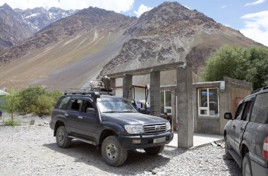 Refueling a car in a filling station at Visav village along the Bartang River in the Gorno-Badakhshan in Tajikistan. The Badakhshan is an autonomous region in eastern Tajikistan, in the Pamir Mountains clipart