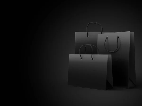 Set of luxury glossy shopping bags in black gradient on black background with copy space, 3d render illustration with clipping path