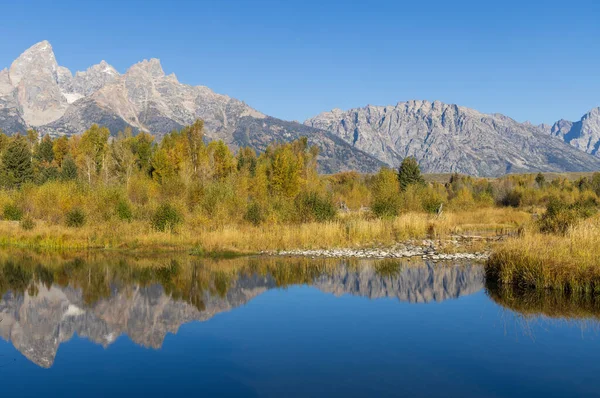 stock image a scenic reflection landscape in the Tetons in autumn