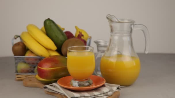 Yellow Refreshing Summer Drinks Fresh Mango Juice Orange Juice Fruit — Stok video