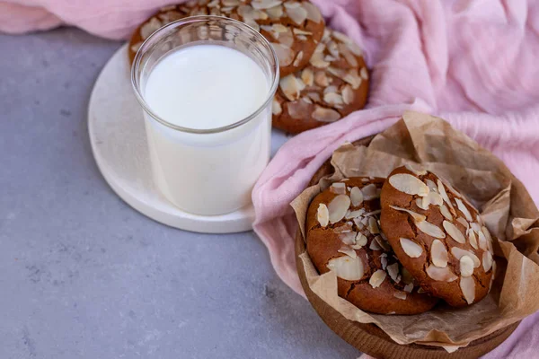 Almond cookies. Food background. Homemade breakfast cookie. Sweet almonds chips snack. Bakery cook. Bake a cake. Glass of milk