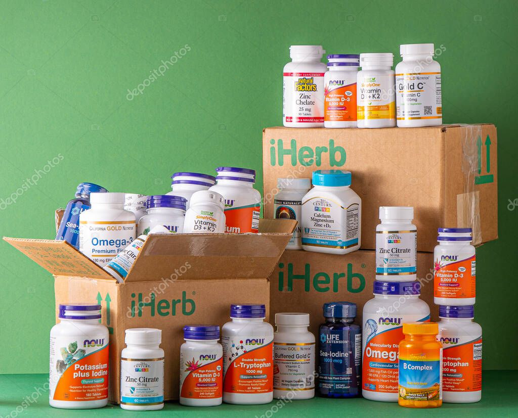 Vitamins, minerals and micronutrients from iHerb box. Lots of different jars. Biologically active food additives. Dietary supplement set buy online. Medicines for health. Kyiv, Ukraine - July 13, 2022
