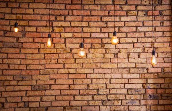 Old Electric Incandescent Lamps Tungsten Filament Backdrop Brick Wall Texture — Stock Photo, Image