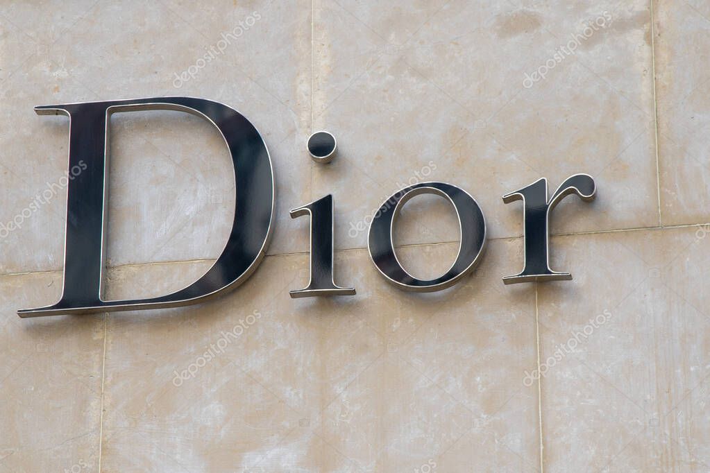Signboard logo of the company DIOR on the store. Kyiv, Ukraine - July 15, 2023.