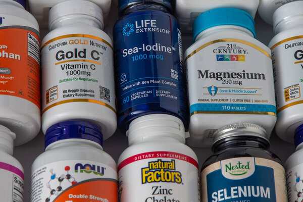 Vitamins, minerals and micronutrients from iHerb. Lots of different jars. Biologically active food additives. Dietary supplement set buy online. Medicines for health. Kyiv, Ukraine - July 13, 2023.