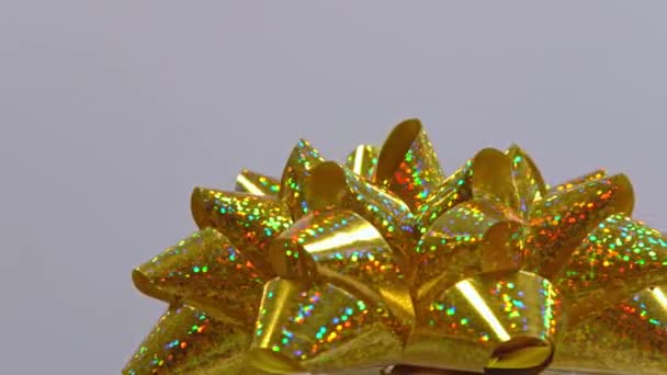 Χρυσή Κορδέλα Φιόγκο Ένα Δώρο — Αρχείο Βίντεο