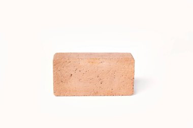 Red bricks are isolated on white background. Clay bricks used for construction, 