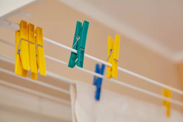 Yellow Green Plastic Clothespins Hanging Modern Dryer Bathroom Close — Photo