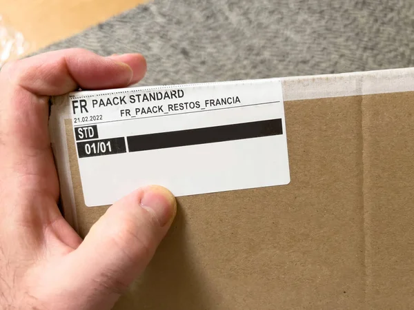 Paris France Feb 2022 Pov Male Hand Holding Package Cardboard — стоковое фото