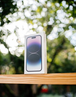 London, United Kingdom - Sept 28, 2022: Hero object of the latest Apple Computers iPhone 14 Pro smartphone with defocused bokeh background