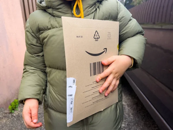 Luxembourg Nov 2022 Male Toddler Holding Amazon Prime Cardboard Parcel — Stock Photo, Image