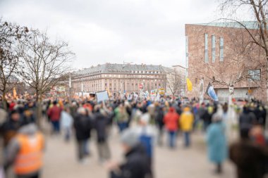 Defocused large crowd at protest against the French governments planned pension reform to push the retirement age from 62 to 64 unions have called for mass social action