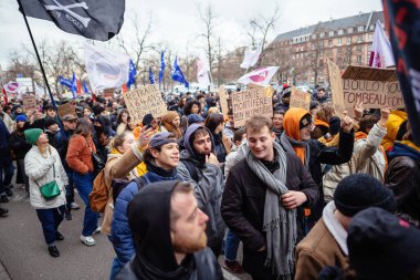 Strasbourg, France - Jan 19, 2023: Elevated view of large crowd at protest against the French governments planned pension reform to push the retirement age from 62 to 64 unions have called for mass