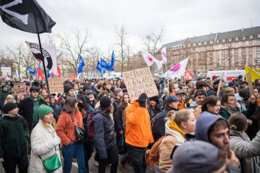 Strasbourg, France - Jan 19, 2023: Elevated view of large crowd at protest against the French governments planned pension reform to push the retirement age from 62 to 64 unions have called for mass