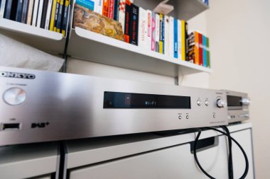Paris, France - Dec 13, 2022: Testing wi-fi on Chromecast built-in, certified sign on new Onkyo NS-6170 network audio player with DSD Hi-Res Audio and DSD DAB