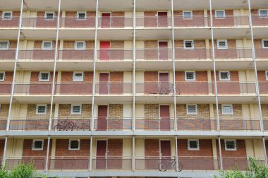 Low angle view of HLM habitation a loyer modere low-income housing apartment building in French city of Strasbourg clipart