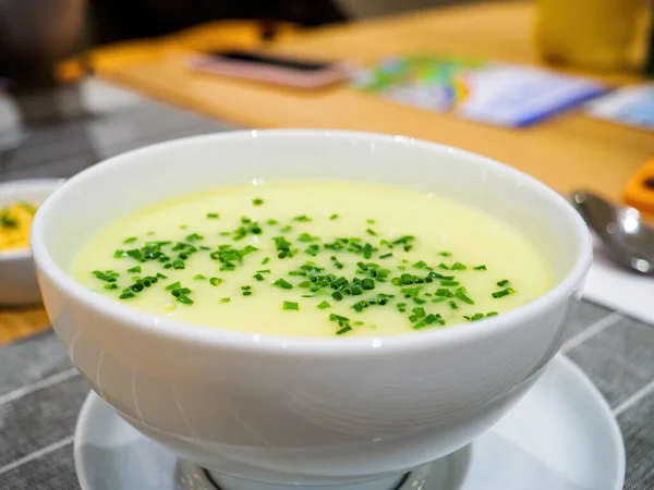 Nourish your body with fresh veggies in a savory broth. Warm up this winter with healthy and clean eating options, like this asparagus and leek soup.