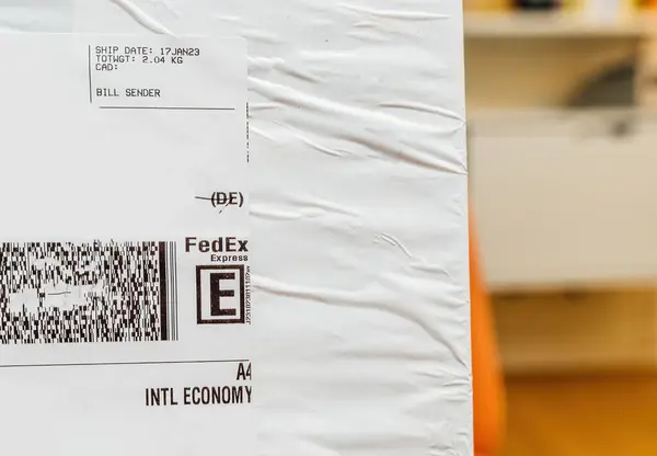 Paris France Jan 2023 Macro Shot Fedex Package Envelope Symbolizing — Stock Photo, Image