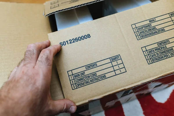 Cardboard Box Opens Reveal Main Unit Connection Cord Operating Instructions — Stock Photo, Image