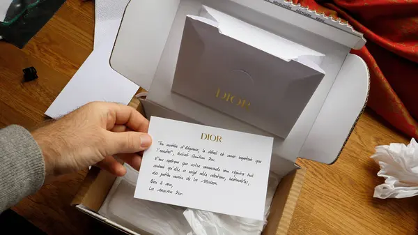 Paris France Sep 2023 Person Unpacks Dior Product Thank You — Stock Photo, Image