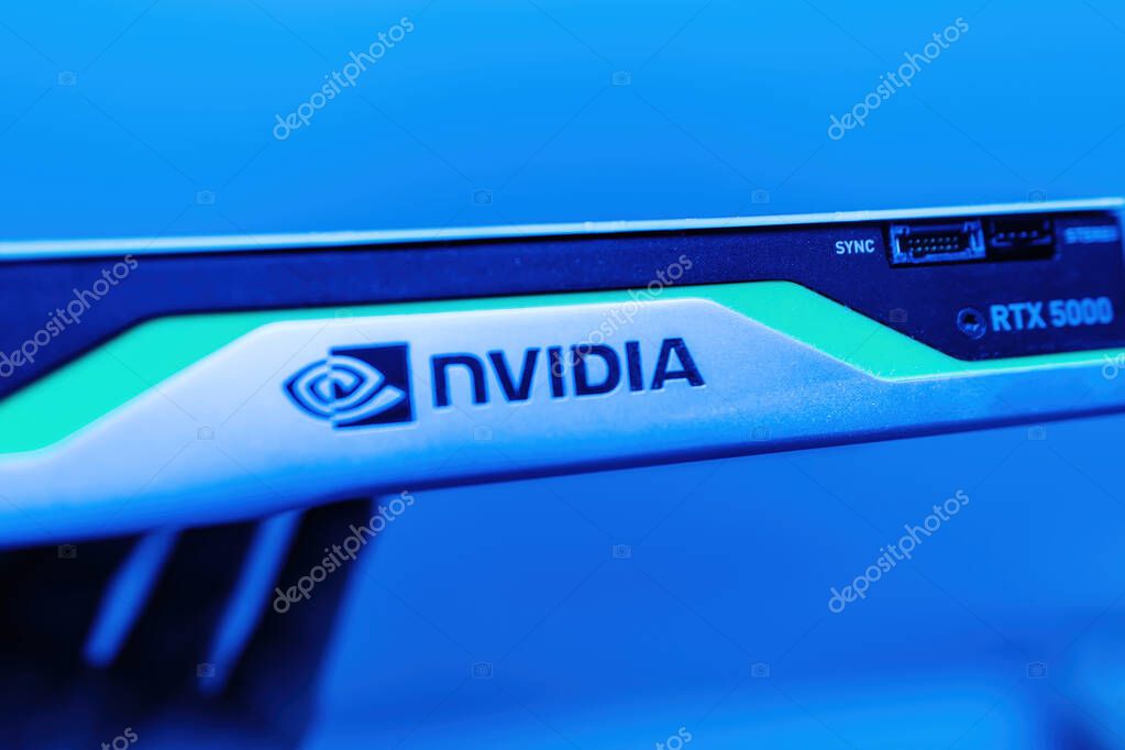 Paris, France - Apr 3, 2024: The NVIDIA logo is visible on a super professional video card with a blue color cast, highlighting the advanced technology and premium design of the hardware