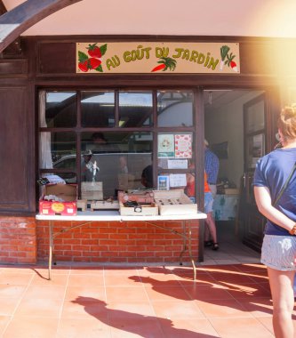 Neufchatel-Hardelot, France - Aug 20, 2024: A small produce stand named Au Gout du Jardin offers fresh, locally sourced fruits and vegetables in Neufchatel-Hardelot, France clipart