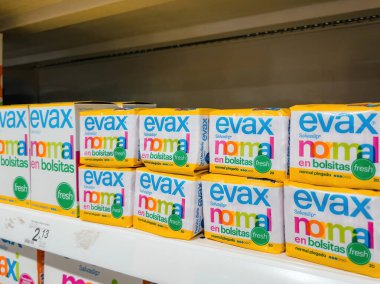 Mallorca, Spain - Jun 28, 2023: Evax Normal en bolsitas Fresh female hygiene products manufactured by Evax in spanish supermarket clipart