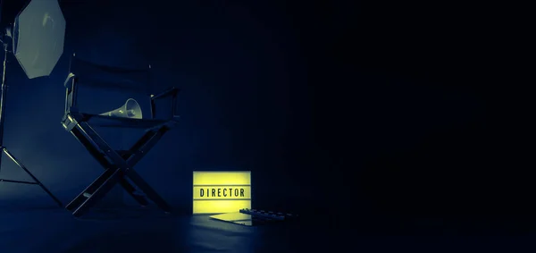 Director chair with cinema lightbox sign Director text on it and clapperboard megaphone and black background studio. Director seat on video production or filming set used in film industry. Real no 3D