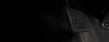 Car accelerate and brake foot pedal. Close up foot press or push foot break and accelerate pedal of a car to drive ahead. Driver driving the car by pressing or pushing accelerator pedals of the car.