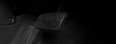 Car accelerate and brake foot pedal. Close up foot press or push foot break and accelerate pedal of a car to drive ahead. Driver driving the car by pressing or pushing accelerator pedals of the car.