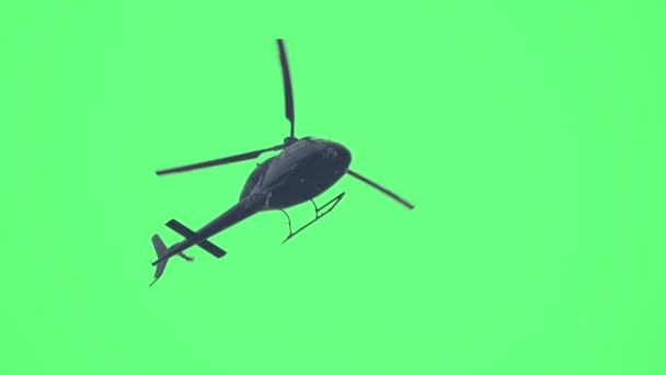 Helikopter Repül Zöld Képernyőn Alacsony Szögű Kamera Realisztikus Helikopter Repülő — Stock videók