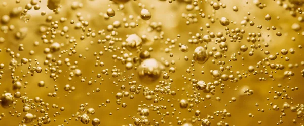Golden Hyaluron Oil Bubbles Collagen Serum Oder Gelben Ölblasen Tropfen lizenzfreie Stockbilder