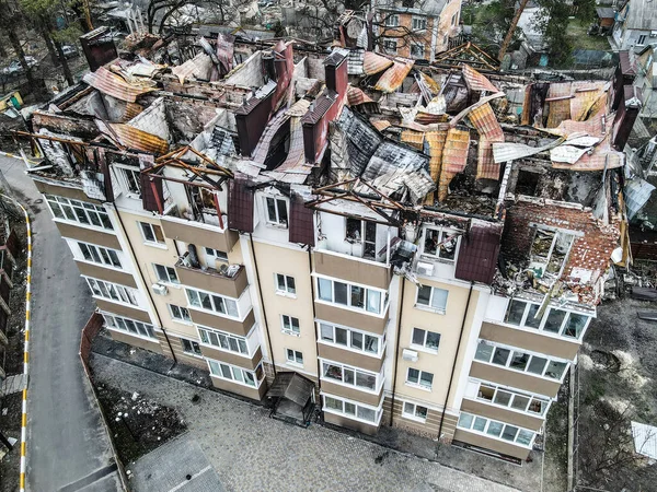 stock image BUCHA, UKRAINE War in Ukraine. Russian army damaged dwelling house in Bucha, Kyiv Region on March 2022. After bombing. Terror and genocide of Ukrainian people