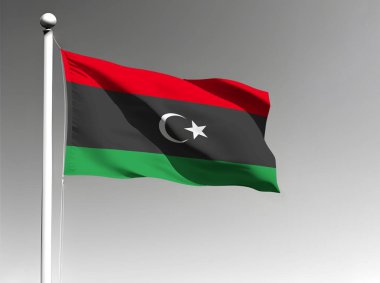 Libya ulusal bayrağı gri arkaplanda dalgalanıyor