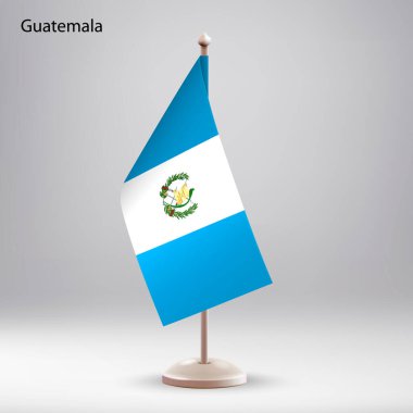 Bayrak standında asılı Guatemala bayrağı. Zirve veya konferans sunumu için kullanılabilir