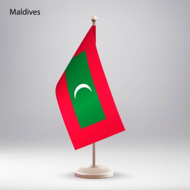 Bayrak standında asılı duran Maldivler bayrağı. Zirve veya konferans sunumu için kullanılabilir