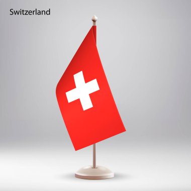 Bayrak standında asılı İsviçre bayrağı. Zirve veya konferans sunumu için kullanılabilir