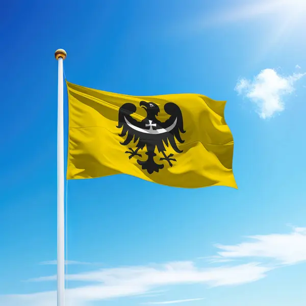 stock image Waving flag of Lower Silesia is a region of Poland on flagpole with sky background.