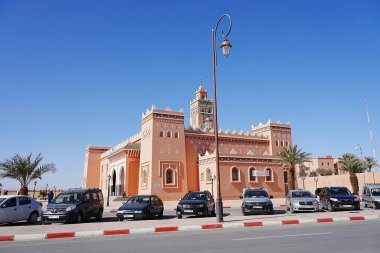 Architecture of mosque in african Zagora town in Draa Tafilalet region in Morocco, clear blue sky in 2023 warm sunny winter day on January.