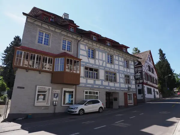 stock image STEIN am RHEIN, SWITZERLAND - AUGUST 12th 2018: Medieval frontage of European town at Schaffhausen canton, clear blue sky in warm sunny summer day.