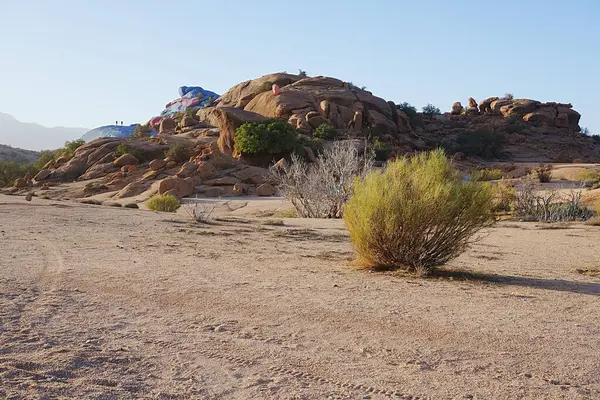 stock image Scenic rocks on desert near African Tafraout town at Tiznit province, Souss-Massa in Morocco, clear blue sky in 2023 warm sunny winter day on January.